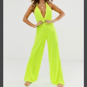 ASOS DESIGN neon yellow plunge neck slinky jersey beach jumpsuit with twist back